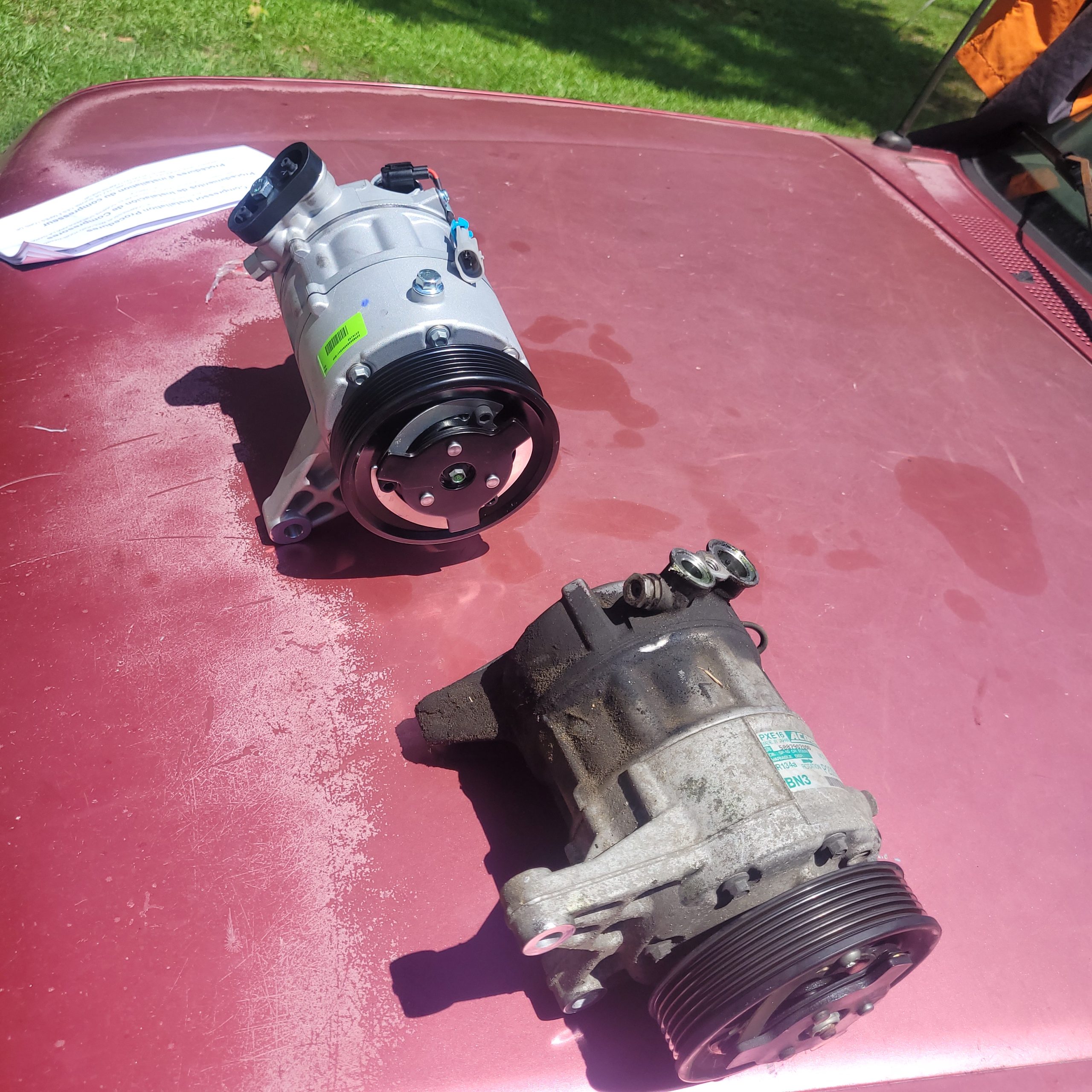 old vs new AC Compressor